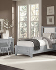 Bonanza - Pebble Gray Upholstered Bed With Storage Footboard
