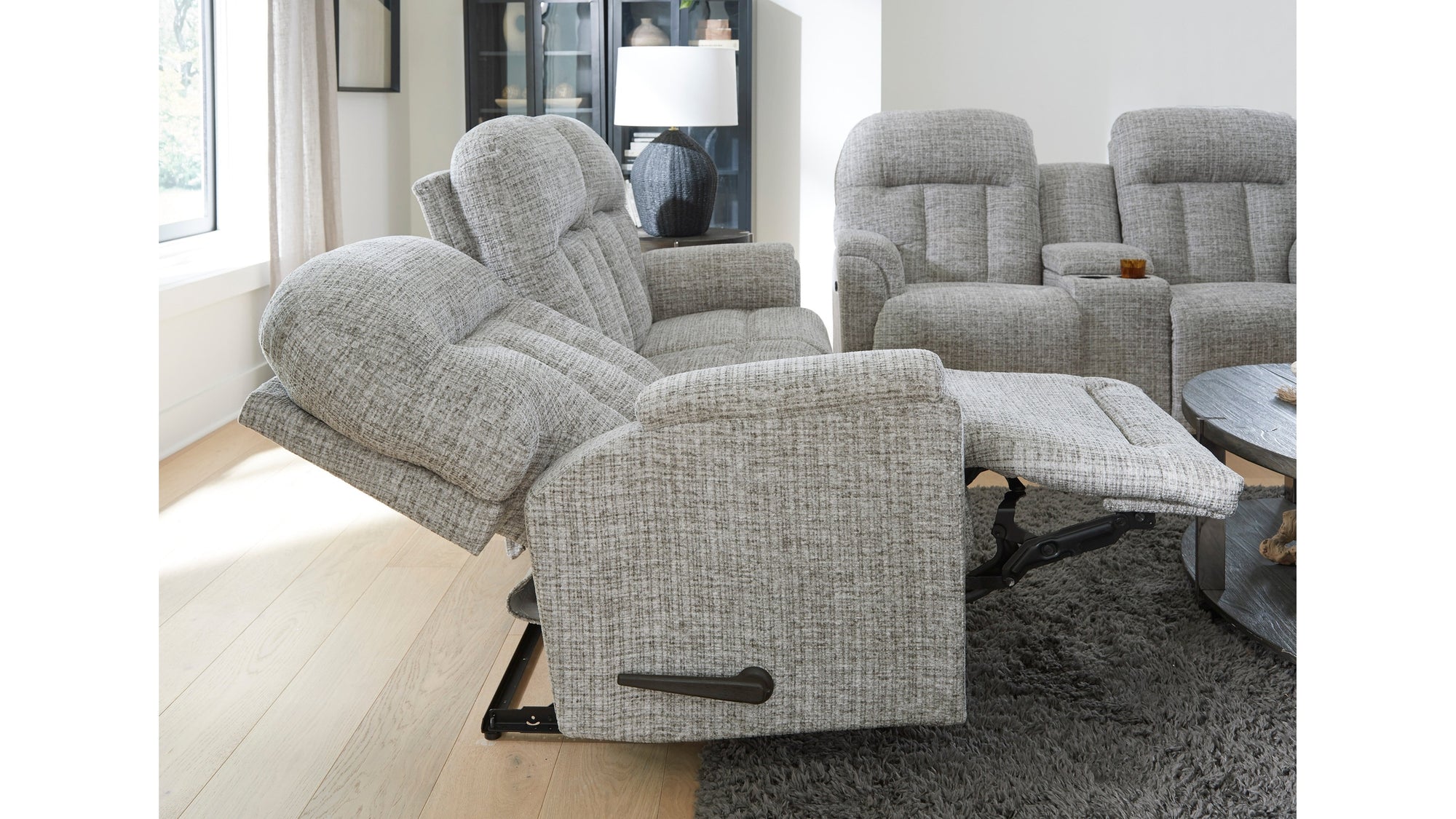 Suitably Reclining Sofa With Overstuffed Pillow Back Design