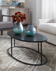 Coreene - Oval Coffee Table - Black